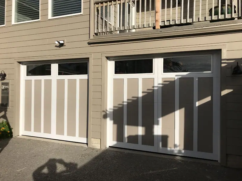 After: Two plain doors replaced with carriage-style doors