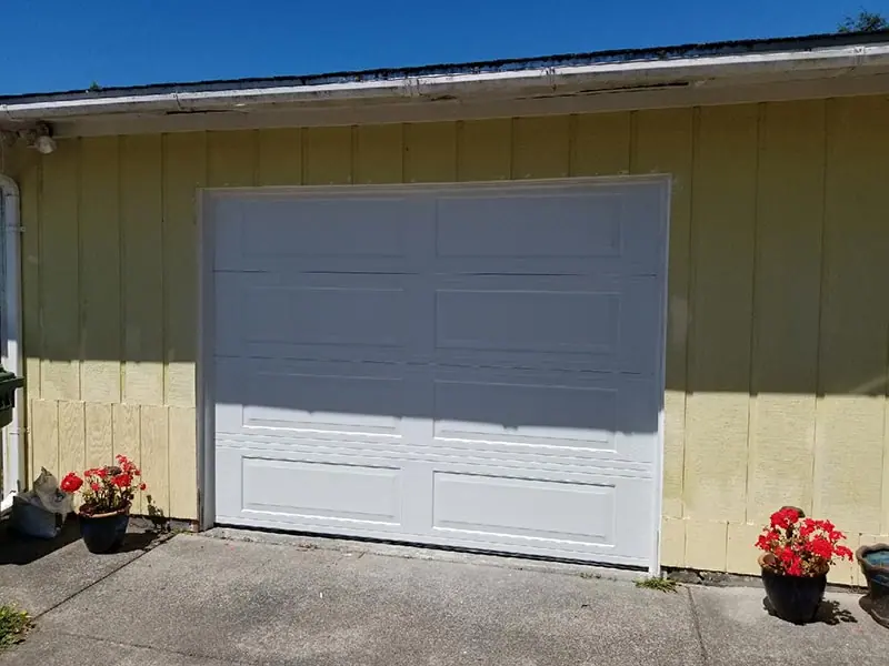 After: Damaged single door with windows replaced