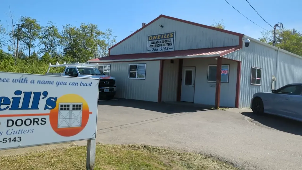 The O'Neill's Overhead Doors shop and sign on H Street in Coos Bay